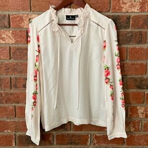 White Floral Blouse with Pink Accents